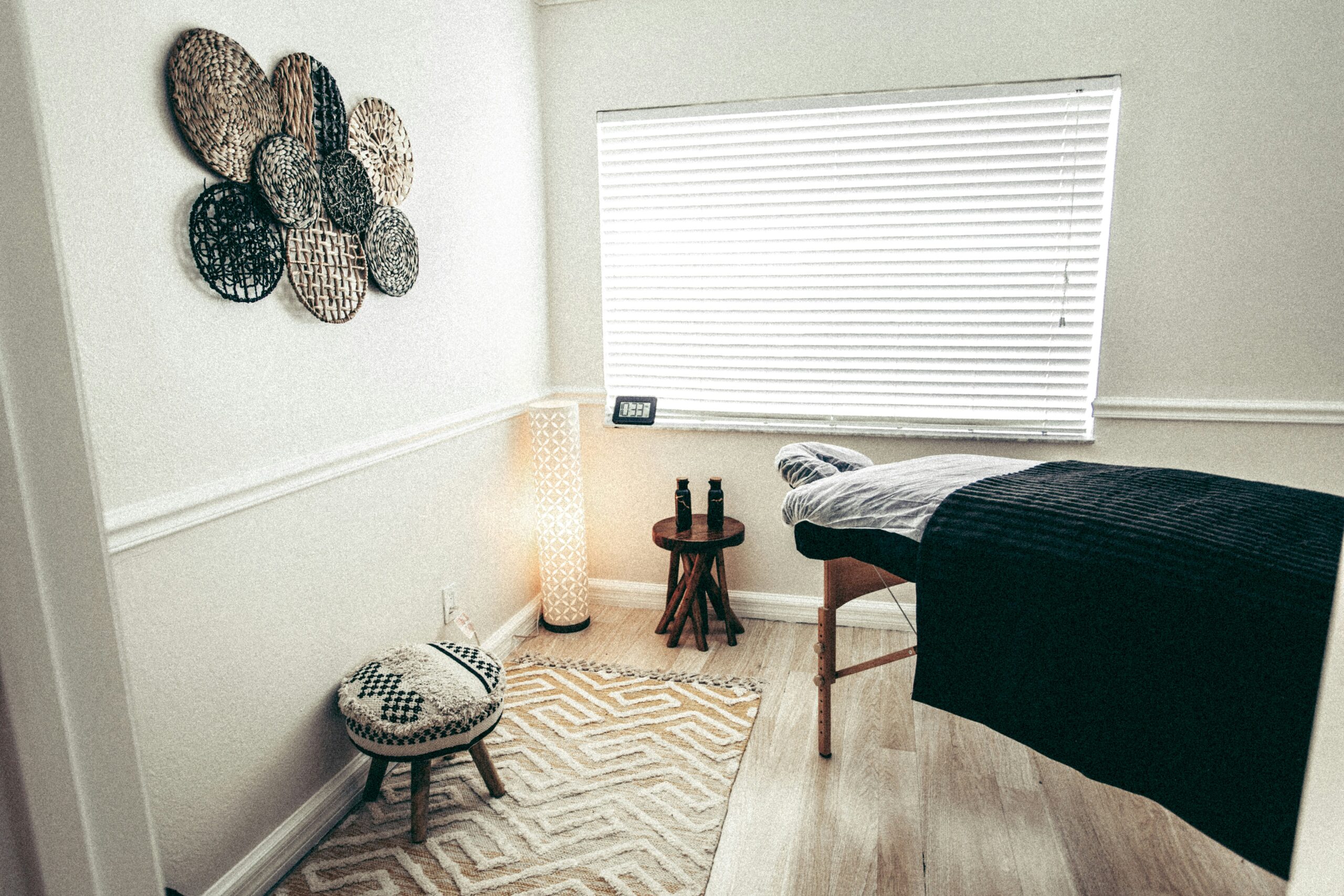 A person receiving a relaxing back massage in a calm studio